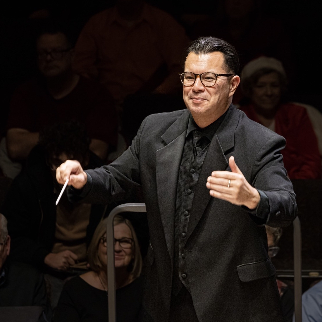 Dr. Jon Noworyta, conducting an ensemble
